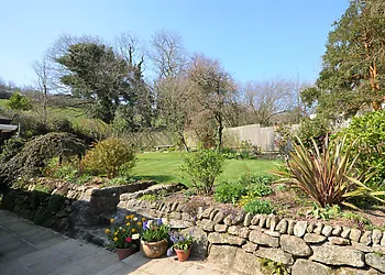 Pretty cottage garden with seating 