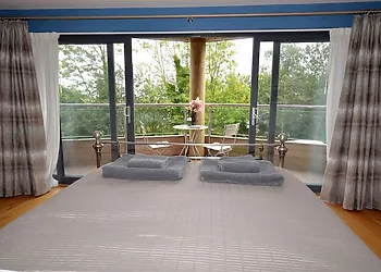 Master bedroom with balcony 