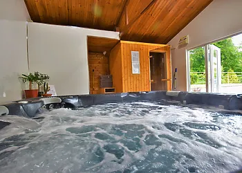 Enclosed private hot tub and sauna