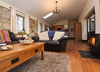 Cosy up in the lounge in front of the woodburner