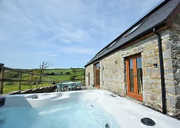 Relax and enjoy the countryside views from the private hot tub