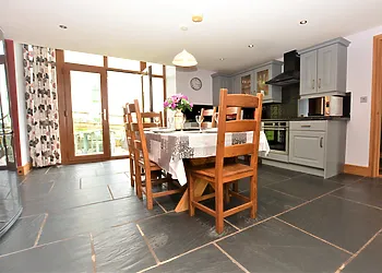 Spacious kitchen/diner with patio doors  leading to the enclosed garden area