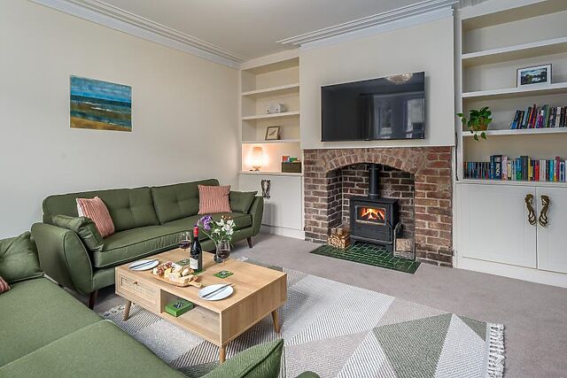 Sunflower House has a wood burner in the original fireplace for after the pub