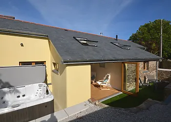 Enclosed rear garden with hot tub