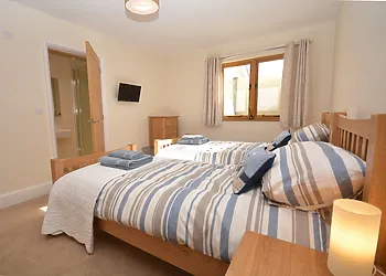King-size bedroom with en-suite shower room