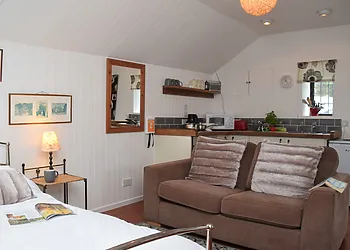 Open plan sleeping/lounge area