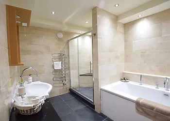 Bathroom with seperate shower on lower ground level