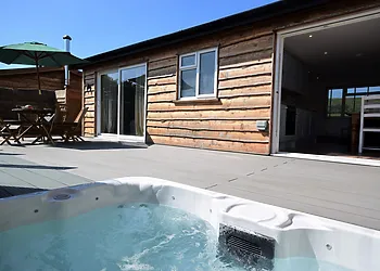 Sunken hot tub in the private enclosed garden 