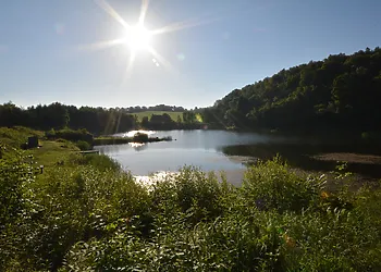 Views across the lake at the front of the property