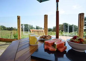 Enjoy breakfast with views over fields