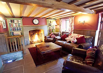 Barn sitting room with open fire