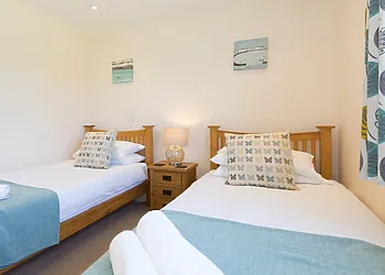 The lovely bright twin bedroom