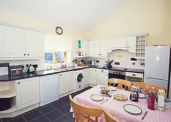 One of two bright kitchen spaces