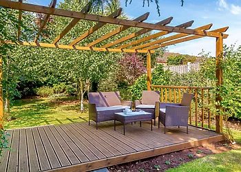 Raised deck with comfortable seating and views of the garden
