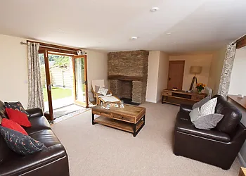 Spacious living area with patio doors to the garden