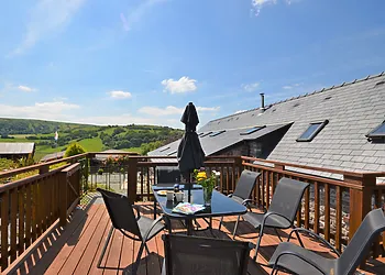 Lovely barn conversion situated in an idyllic hillside location with spectacular terrace views