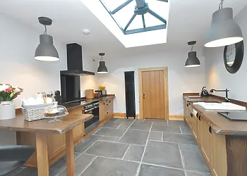 Kitchen with orangery style ceiling