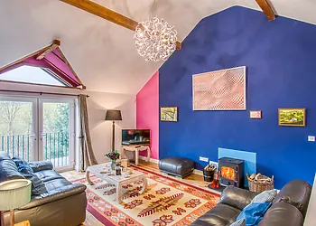 Enjoy lovely views over the garden from the French doors, let the outside in