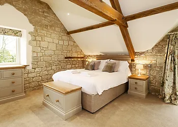 King-size bedroom with countryside views