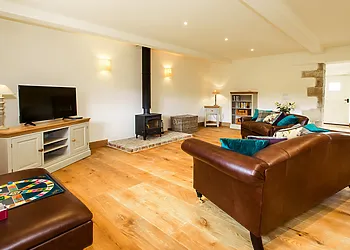 Lounge with woodburner perfect for those cooler evenings