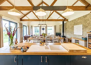 Lounge/kitchen/diner with impressive apex ceiling 