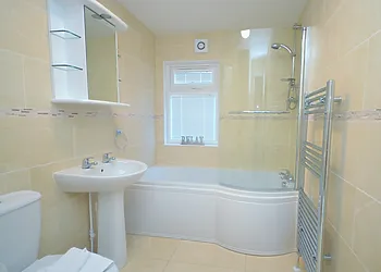 Bathroom with shower over the bath