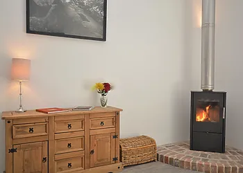 Relax by the cosy wood burner