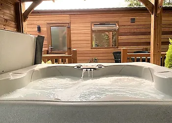 Hot tub with shelter above