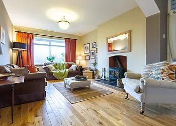 Welcoming lounge with roaring wood burner