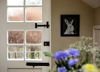 Step into the entrance hallway and immediately relax in this home from home