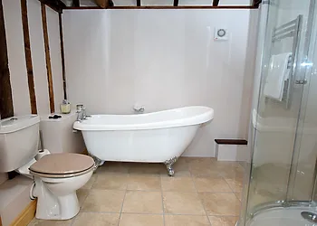 Bathroom with roll top bath 