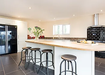 Kitchen area leading out to decking and hot tub