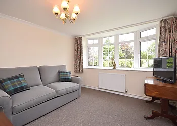 Second lounge/snug with sofa bed and views of gardens