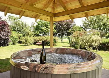 Undercover hot tub with beautiful views