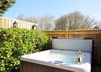Private hot tub in enclosed garden