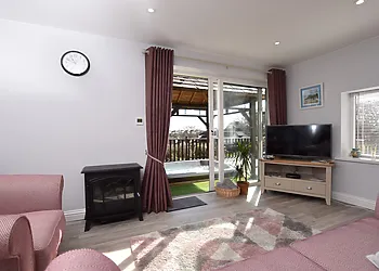 The warm and welcoming lounge with garden view