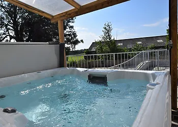 Hot tub area with countryside views