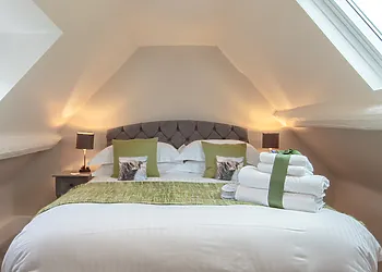 King-size bedroom with a splash of colour