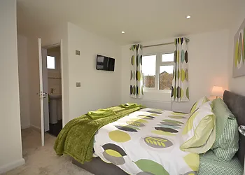 Master double bedroom with en-suite and TV