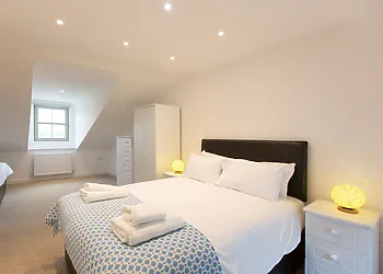 Second double bedroom with additional single bed