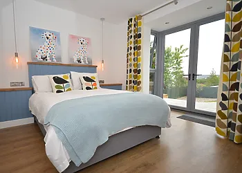 Master king-size leading out to the patio and private hot tub