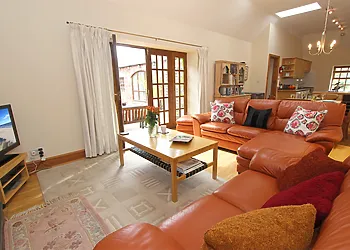 The comfortable lounge with access to the patio