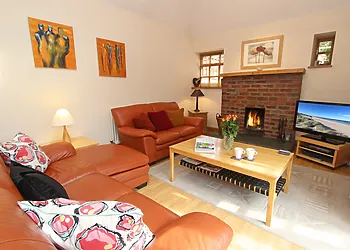 Relax and cosy up in front of the wood burner