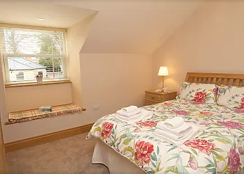 Super-king-size bed (can be made up as a Twin on request)