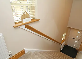 Stairs from entrance to first floor