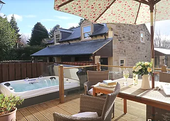 Relax in the hot tub after a day out exploring