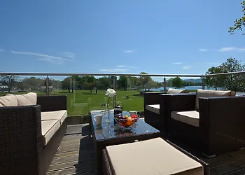 Enjoy al fresco dining on the balcony and admire the stunning views