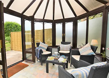 Step into the conservatory from the sitting room which leads to the garden