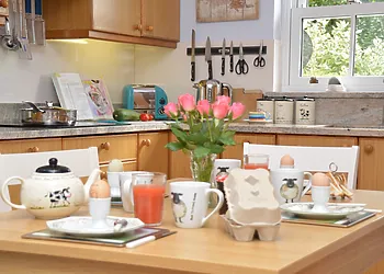 Enjoy leisurely meals at the dining table in the kitchen