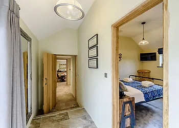 Hall way with steps to the ground floor bedrooms 